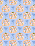 Watercolor seamless fall pattern with peach floral pumpkins and blue bows on a pale blue diamond lattice background.